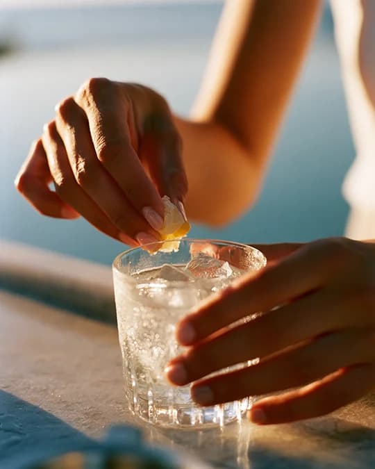 Close-up lifestyle image of hands saved to a board